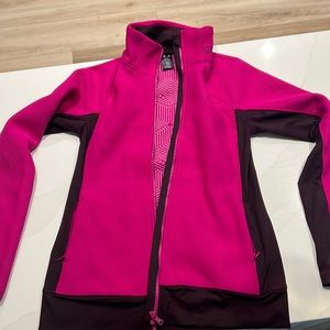 Women's Under Armour infrared cold gear light zip up jacket.